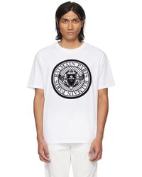 Balmain - T-shirt avec imprimé de monnaie affluée - Lyst