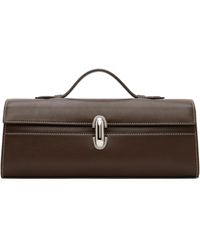 SAVETTE - Slim Symmetry Pochette Top Handle Bag - Lyst