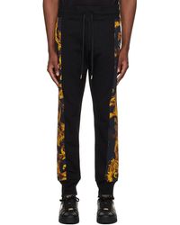 Versace - Pantalon de survêtement noir à motif watercolor couture - Lyst