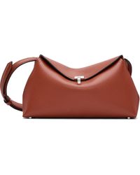 TOTEME - T-Lock Grained-Leather Clutch - Lyst