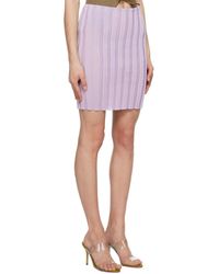 Top en tricot rose, vert et bleu avec col en dentelle | Essentiel