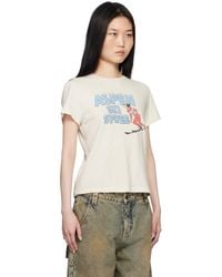 “RE DONE” Snoopy Ski Tシャツ VintageIvory RE/DONE RINGER SKIING SNOOPY TEE - VINTAGE IVORY/MIDNIGHT