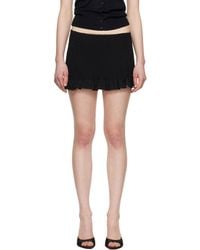 GUIZIO - Apolline Smocked Miniskirt - Lyst