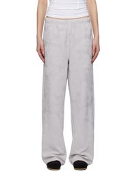 A Bathing Ape - Pantalon De Détente Ample Gris À Motif Camouflage En Jacquard Et À Plaque À Logo - Lyst