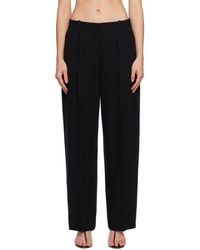TOTEME - Wide Fluid Trousers - Lyst