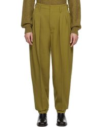 Lemaire - Green Pleated Tapered Trousers - Lyst