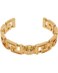 Versace - Bracelet manchette doré à méduse et à motif à clé grecque - Lyst