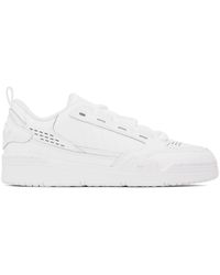 Adidas originals triple white hotsell falcon trainers