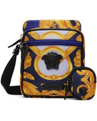 Versace - Sac bleu et doré à motif graphique imprimé - Lyst