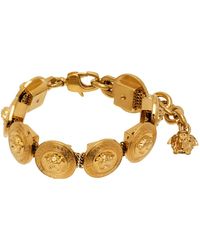 Versace - Bracelet doré à médaillons tribute et à breloque à méduse - Lyst