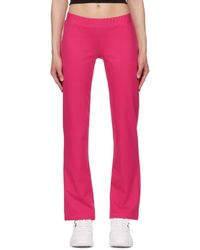 Versace - Pantalon de détente rose à ornements facettés - Lyst