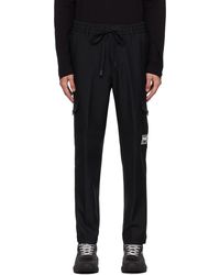 Versace - Pantalon cargo noir à étiquette à logo piece number - Lyst