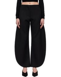 Alaïa - Petal Wool Trousers - Lyst