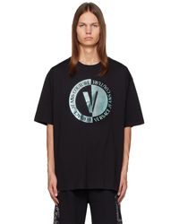Versace - T-shirt noir à logo circulaire - Lyst