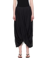 TOTEME フルイドジャージー ミディスカート ブラック | Lyst