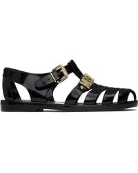 Moschino - Sandales Noires En Caoutchouc À Ferrures À Logo - Lyst