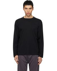 Courreges - Twisted Logo Long Sleeved T-Shirt - Lyst