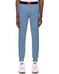HUGO - Pantalon de survêtement bleu à écusson à logo - Lyst