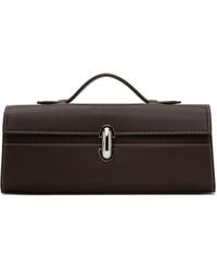 SAVETTE - Slim Symmetry Pochette Bag - Lyst