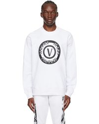Versace - Pull molletonné blanc à logo circulaire - Lyst
