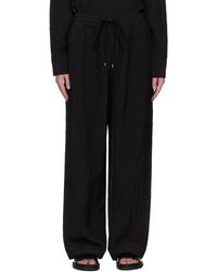 【関税込み】Studio Nicholson ブラック Capel トラウザーズ Studio Nicholsonのブラック Capel トラウザーズがセール中