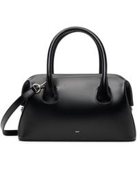 OSOI Slide Brot Bag in Black | Lyst