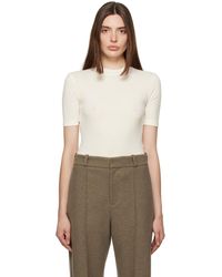 GIA STUDIOS - Justaucorps Blanc Cassé À Col Ras Du Cou - Lyst