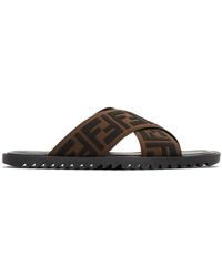 Fendi Claquettes en caoutchouc à logo - Marron