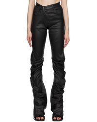 OTTOLINGER - Pantalon noir en cuir synthétique à fronces - Lyst