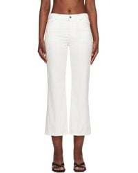 TOTEME - Kick Flare Jeans - Lyst