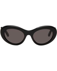 Balenciaga - Lunettes de soleil ovales noires - Lyst