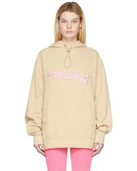 Femme Vêtements Articles de sport et dentraînement Sweats à capuche Hoodie à logo brodé Coton Jacquemus en coloris Neutre 