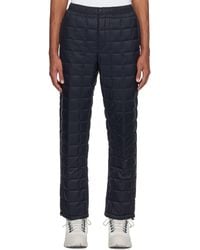 Taion - Quilted Down Trousers - Lyst