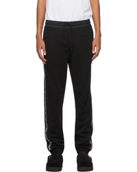Moncler - Pantalon de survêtement noir à logo contrecollé - Lyst