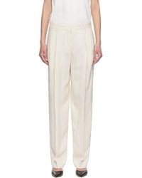 TOTEME - Off Double-Pleat Fluid Trousers - Lyst