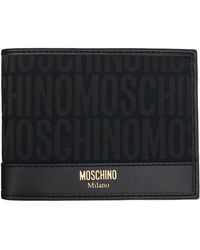 Moschino - Portefeuille noir à logos - Lyst
