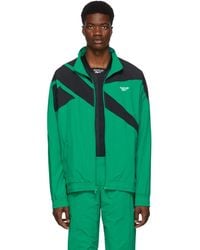Reebok Tracksuits for Men - Up to 60% off at Lyst.com
