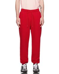 Nike Pantalon de détente brossé - Rouge