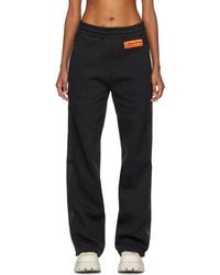 Heron Preston Track pants and sweatpants for Women - Up to 50% off 