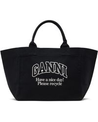 人気！GANNI レッド レオパードプリント キャンバストートバッグ Ganni レッド オーバーサイズ レオパードプリント キャンバス