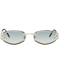 Cartier - Lunettes de soleil ovales doré et vert - signature c de - Lyst