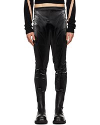 Mugler - Pantalon noir à motif et logo gaufrés - Lyst