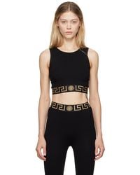 Versace - Soutien-gorge de sport noir à ourlet à motif à clé grecque - Lyst