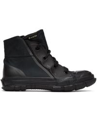Converse Baskets montantes noires Chuck Taylor MC18