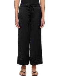 TOTEME - Satin Drawstring Trousers - Lyst