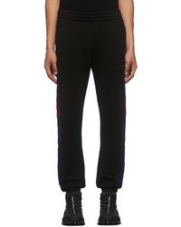 Moncler - Pantalon de survêtement noir en coton à logo - Lyst