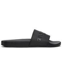 all black givenchy slides