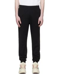 Moncler - Logo Cotton Fleece Track Pants - Lyst