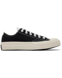 Converse Baskets blanc casse Logo Play Chuck 70