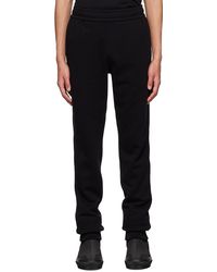 Burberry - Pantalon de survêtement noir en coton - Lyst